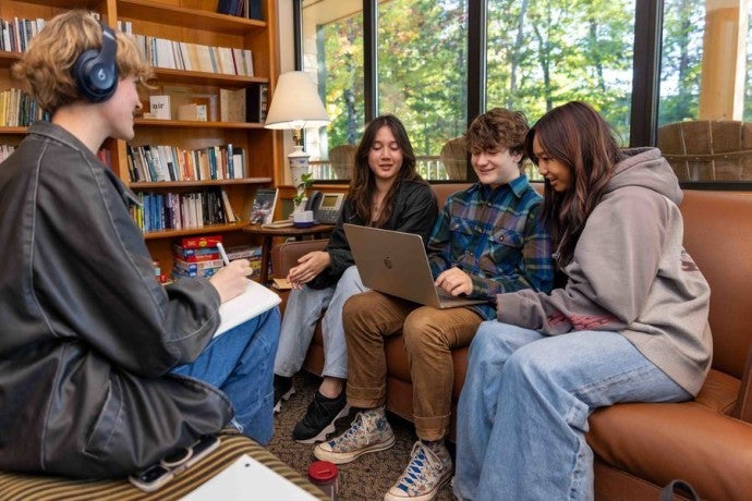 Creative writing students gather to work on their projects in The Writing House.