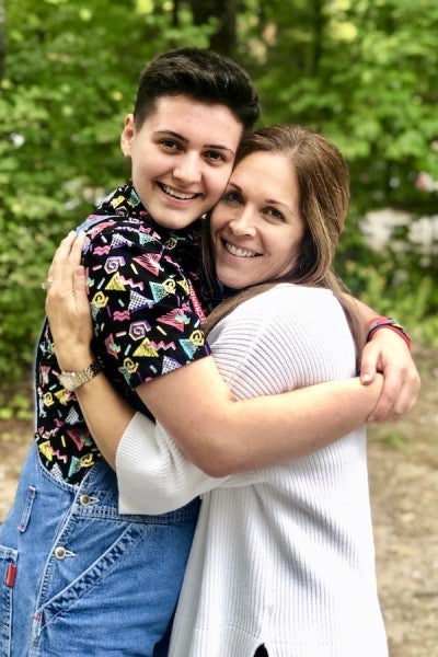 Two women hugging